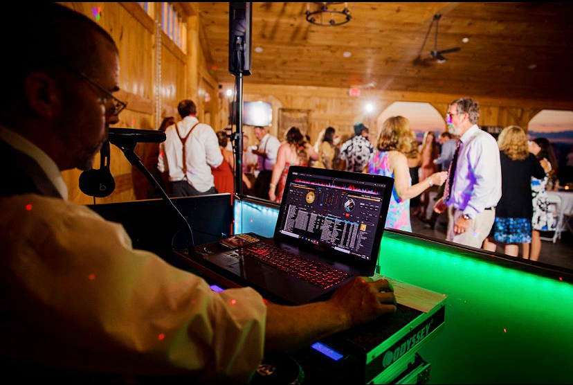 Mix It Up! Providing dj services at a wedding where a group of people are dancing