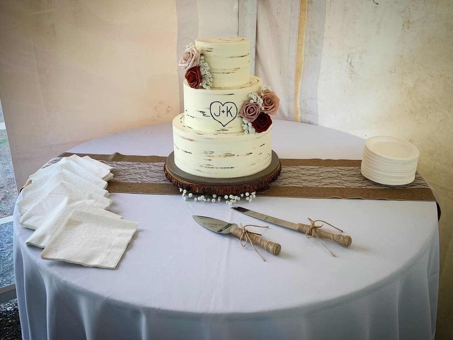 Mix It Up! custom wedding cakes 3 tier to look like a white birch tree bark with the initials inside a heart