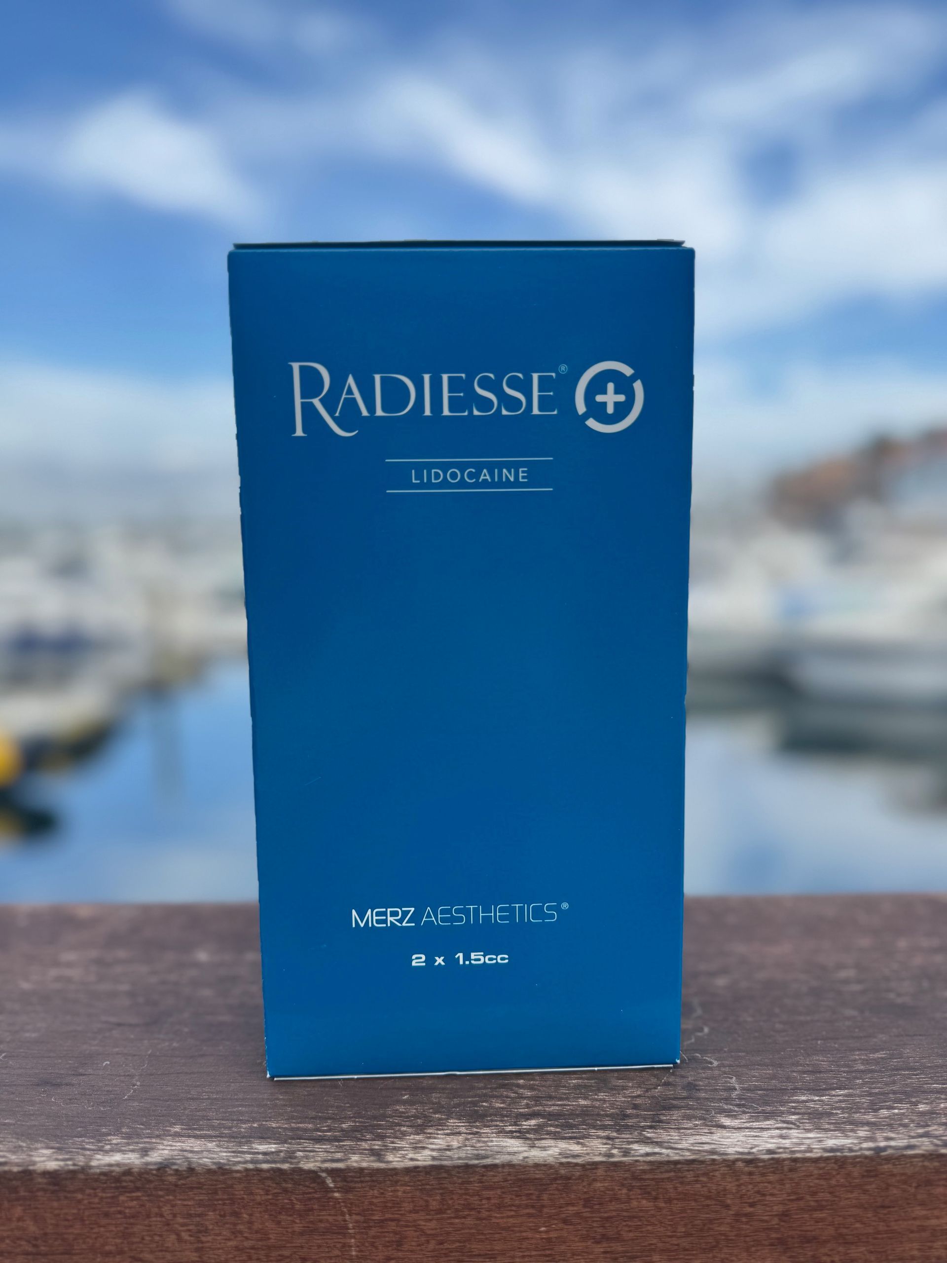 Two boxes of radiesse sit on a shelf