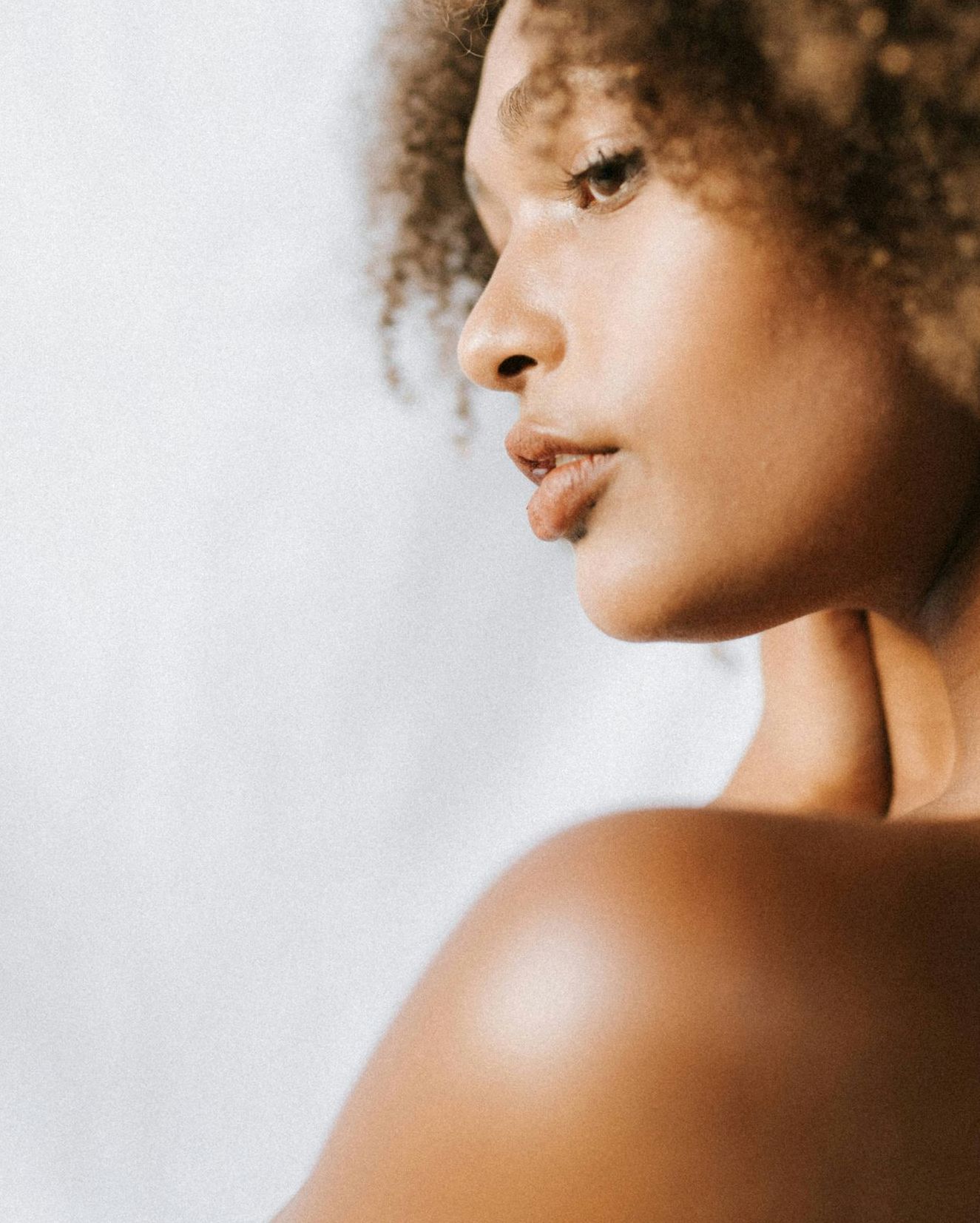 man looking in a mirror and smiling