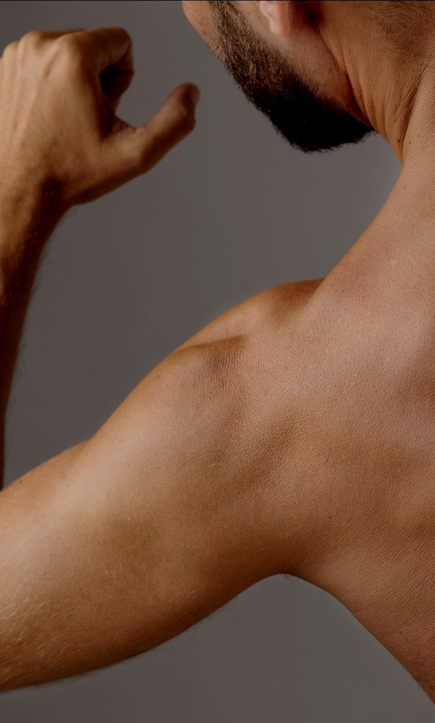 A doctor is giving an iv to a patient in a hospital bed.