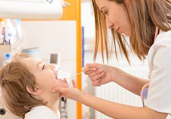 Nurse Checking The Mouth Of The Child — Gastonia, NC — MedScreen Inc.