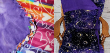 Two fleece blankets: one tie-dye and hearts, the other star print, draped over a chair.