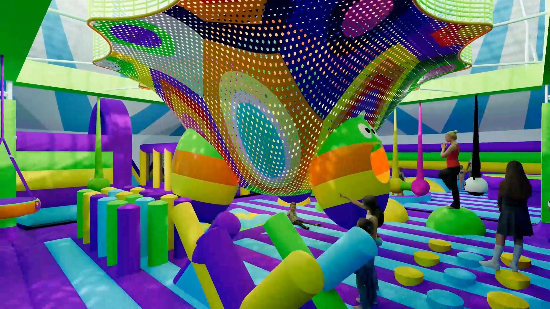 A group of people are playing in a colorful inflatable playground.