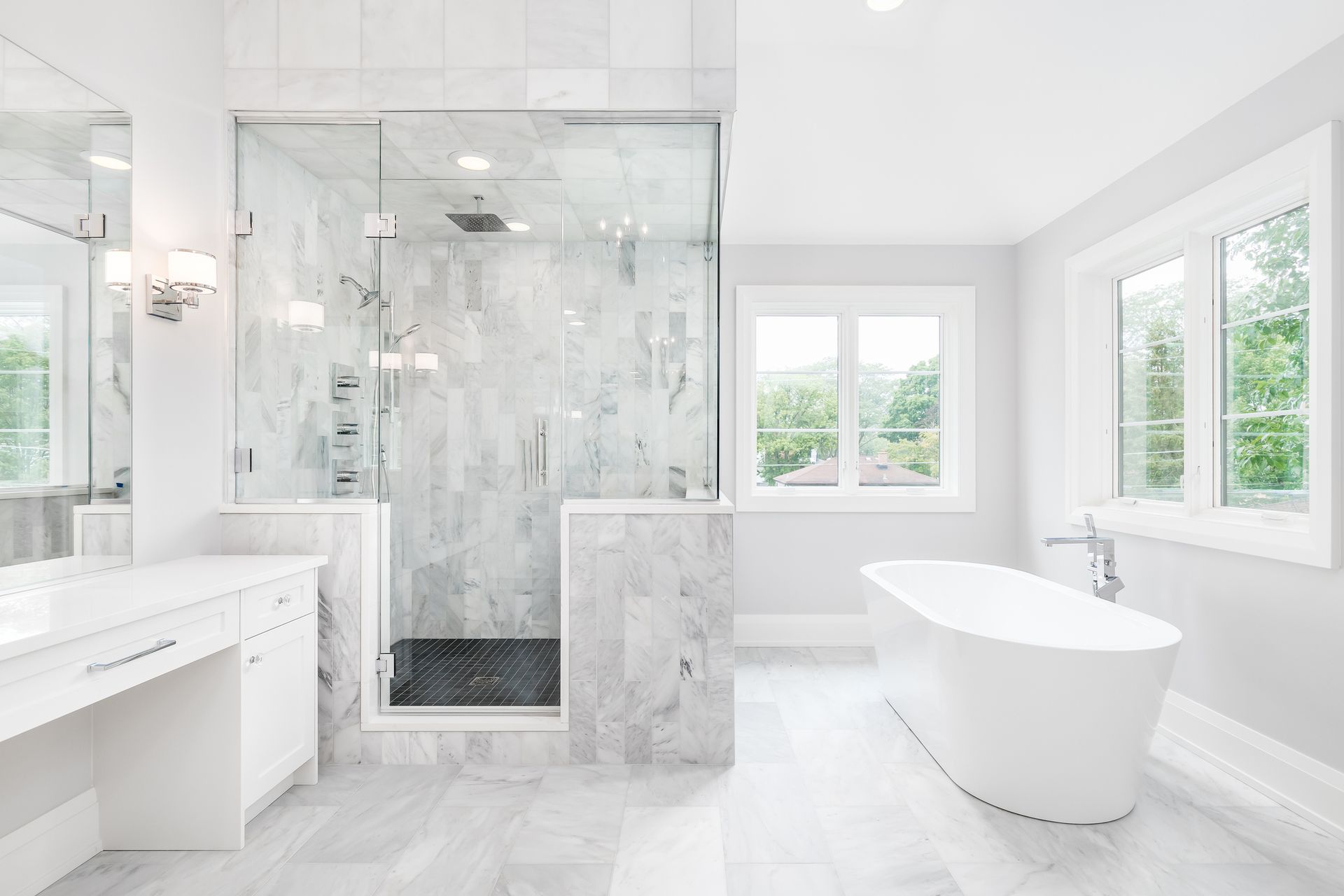 Luxury bathroom showcasing tiled shower and bathtub, perfect for bathroom renovation ideas. Luxury bathroom showcasing tiled shower and bathtub, perfect for bathroom renovation ideas.