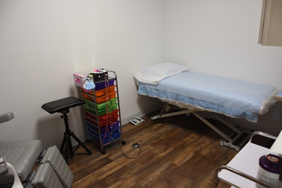 There is a bed in the middle of the room.