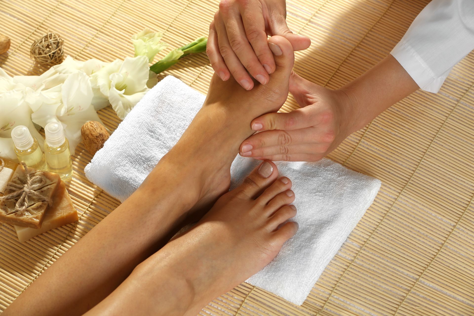 massaging woman's feet