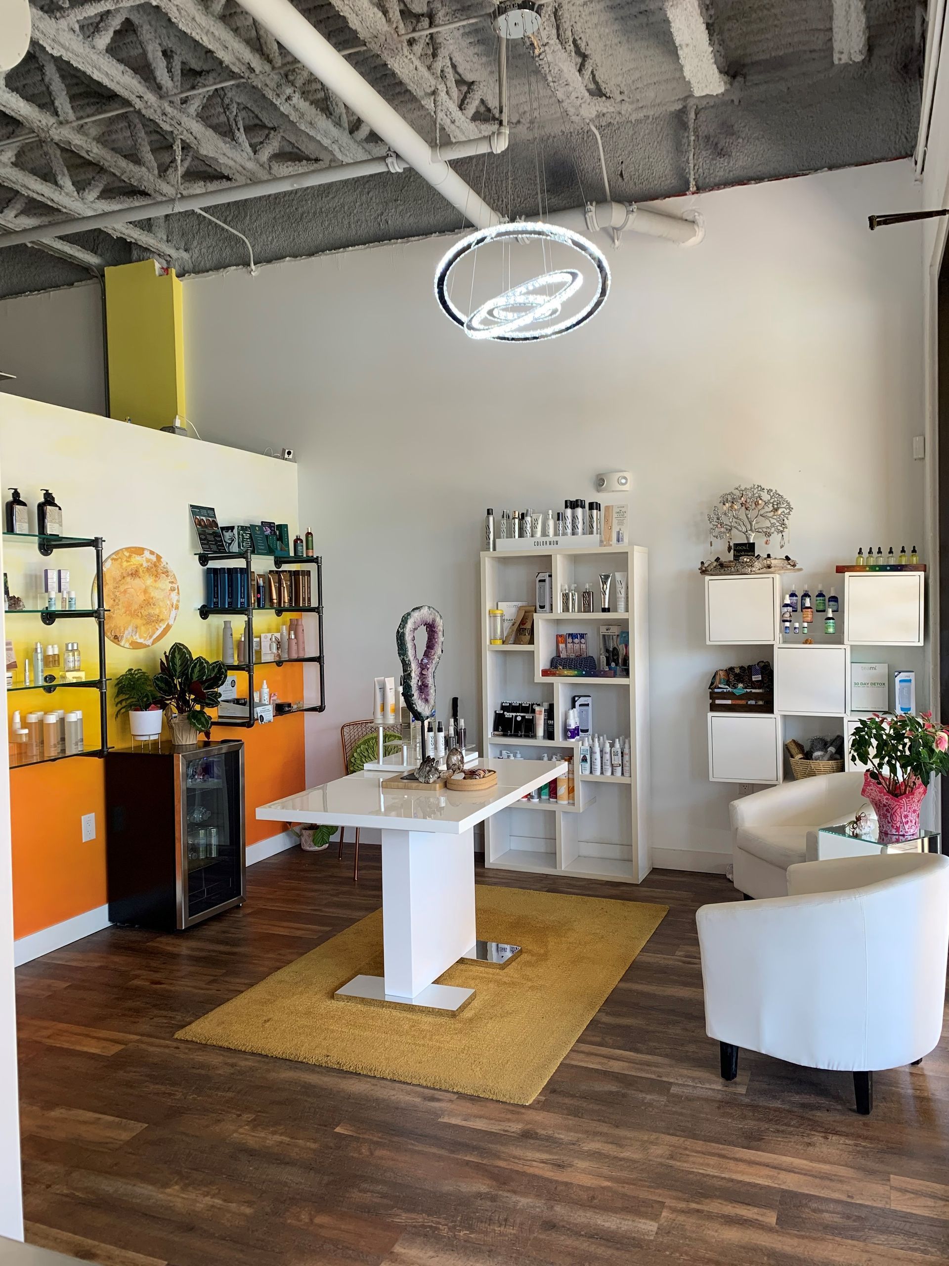 A room with a table and chairs in it