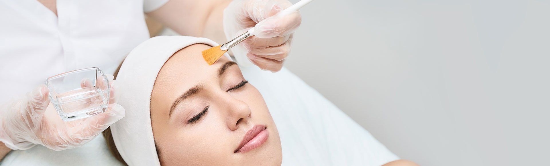 A beautiful young woman relaxing in a spa