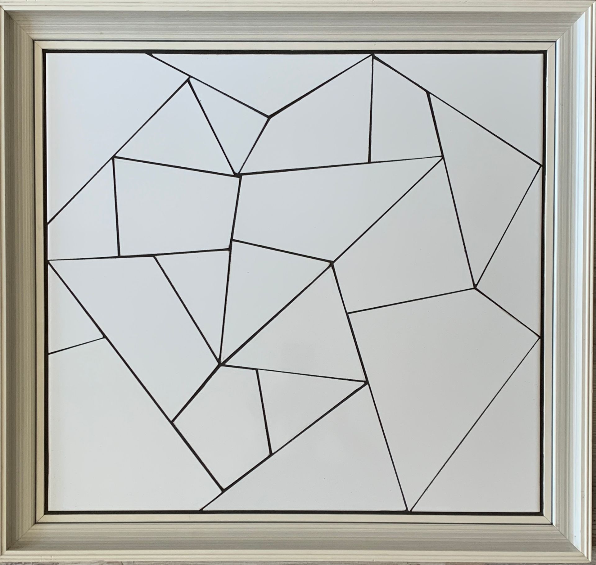 Een afbeelding van een geometrisch patroon in een kader