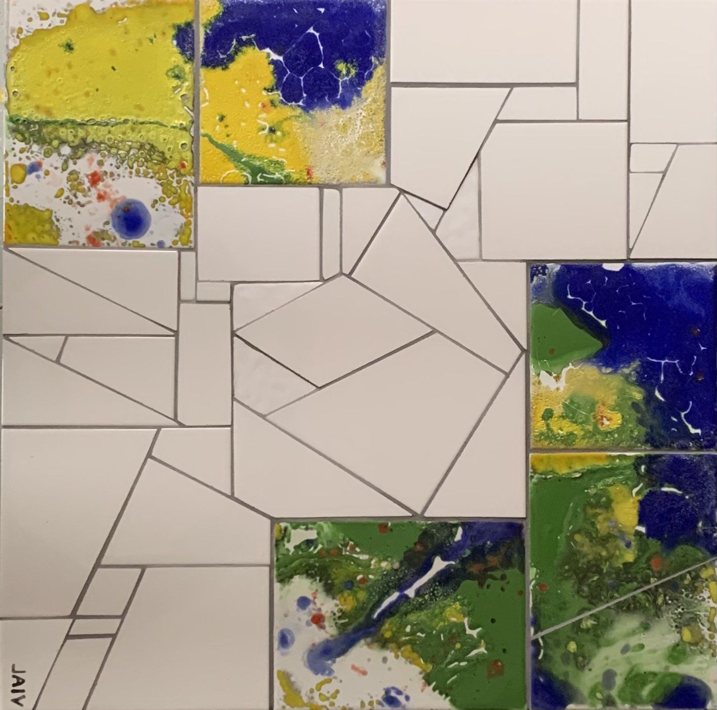 Een tegelmozaïek van een landschap