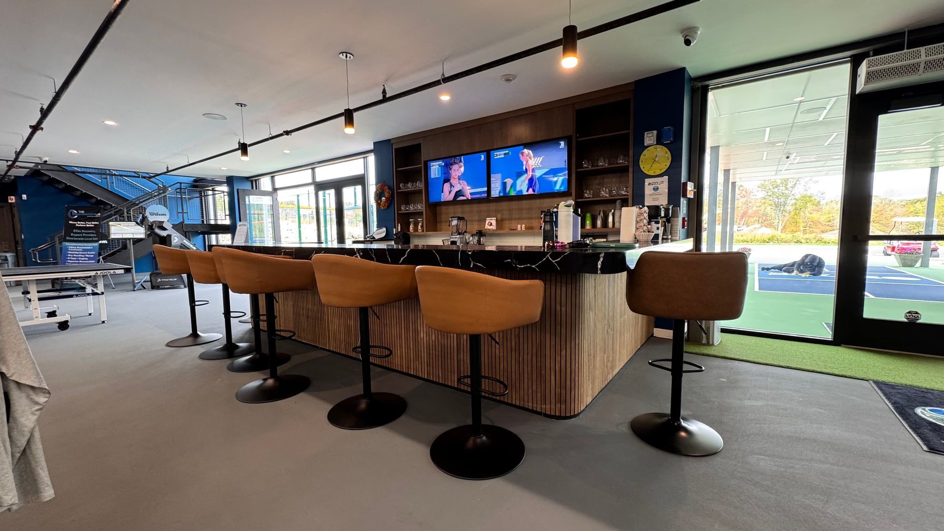 Promotional graphic: Connecticut, the next padel and pickleball hotspot, with cityscape and sports equipment on a court.