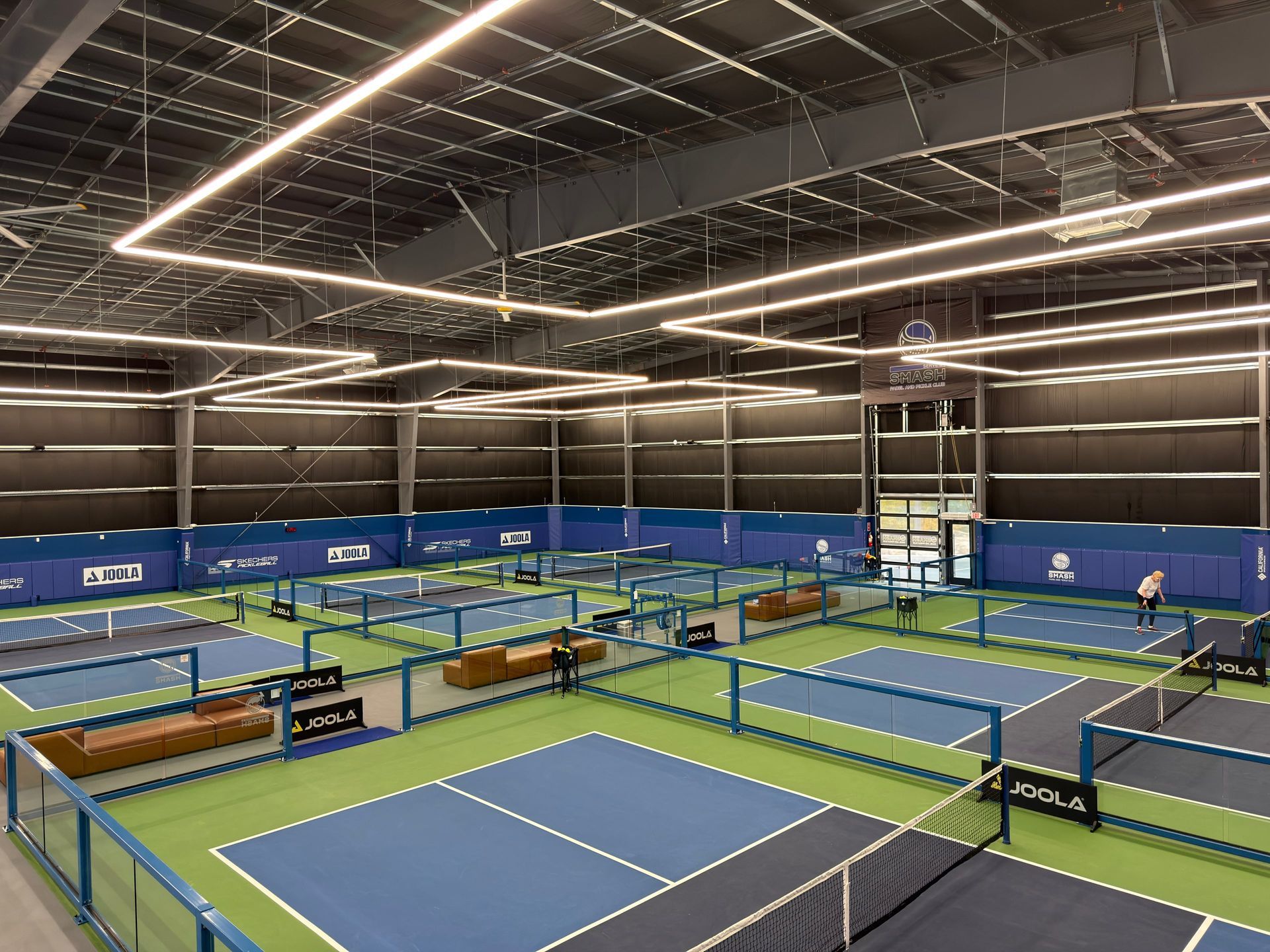 Promotional graphic: Connecticut, the next padel and pickleball hotspot, with cityscape and sports equipment on a court.