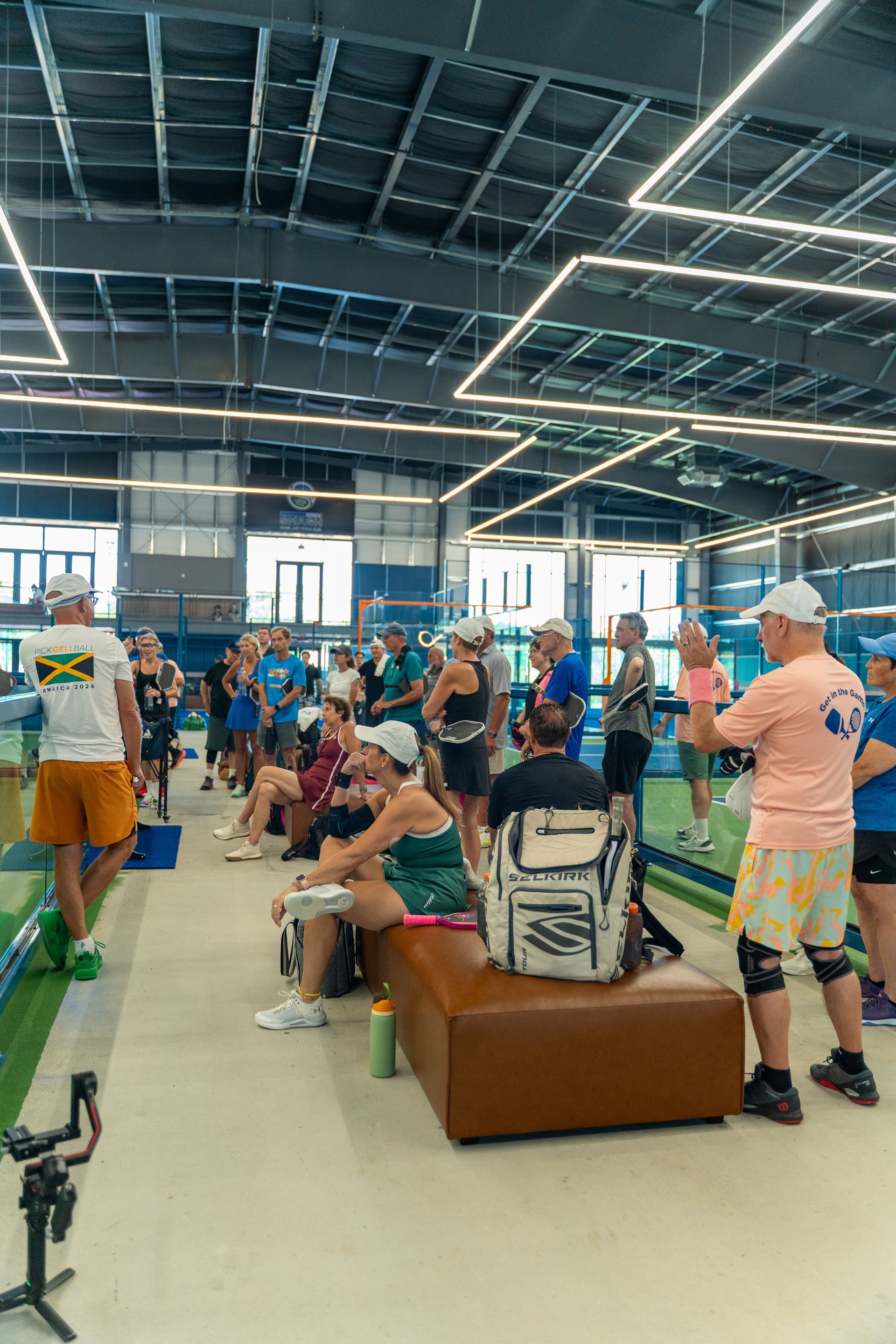 Promotional graphic: Connecticut, the next padel and pickleball hotspot, with cityscape and sports equipment on a court.