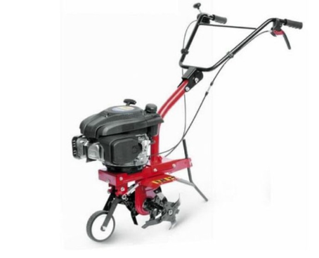 Un piccolo tosaerba rosso e nero con un motore nero