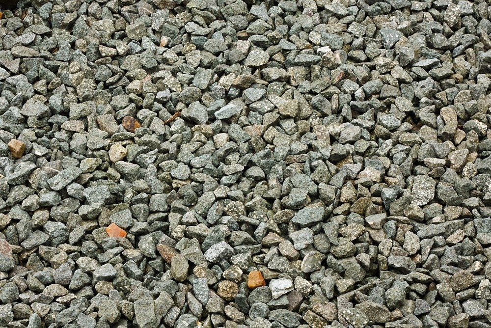 A Pile of Gravel is Sitting on the Ground — Jammach Earthmoving in Mid North Coast, NSW