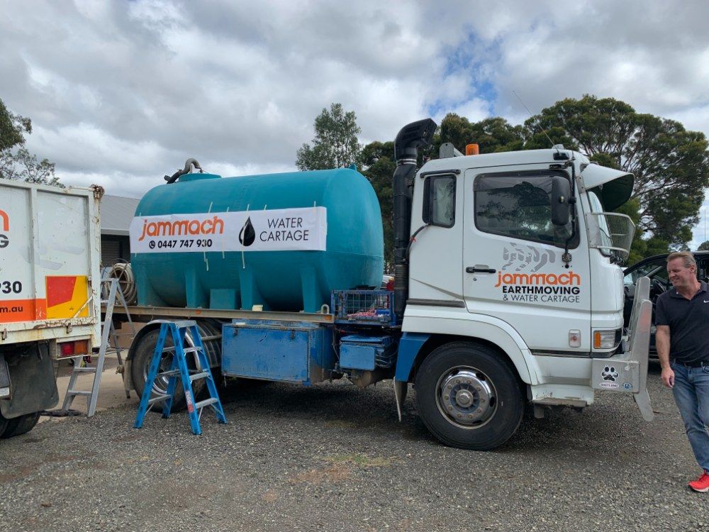A Large Blue-White Truck — Jammach Earthmoving in Central Coast, NSW