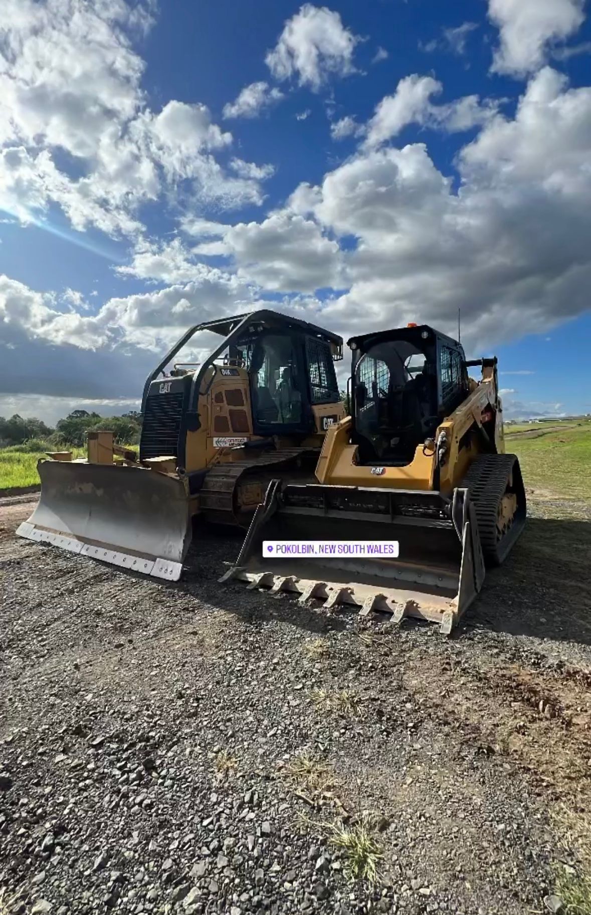 Two Bulldozers Are Parked Next to Each Other on a Gravel Road — Jammach Earthmoving in Nulkaba, NSW
