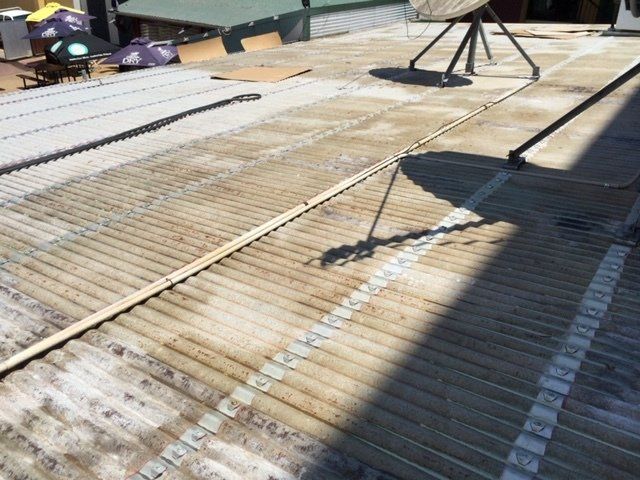 Roof Restoration 1 — Universal Coatings & Maintenance in Darwin City, NT