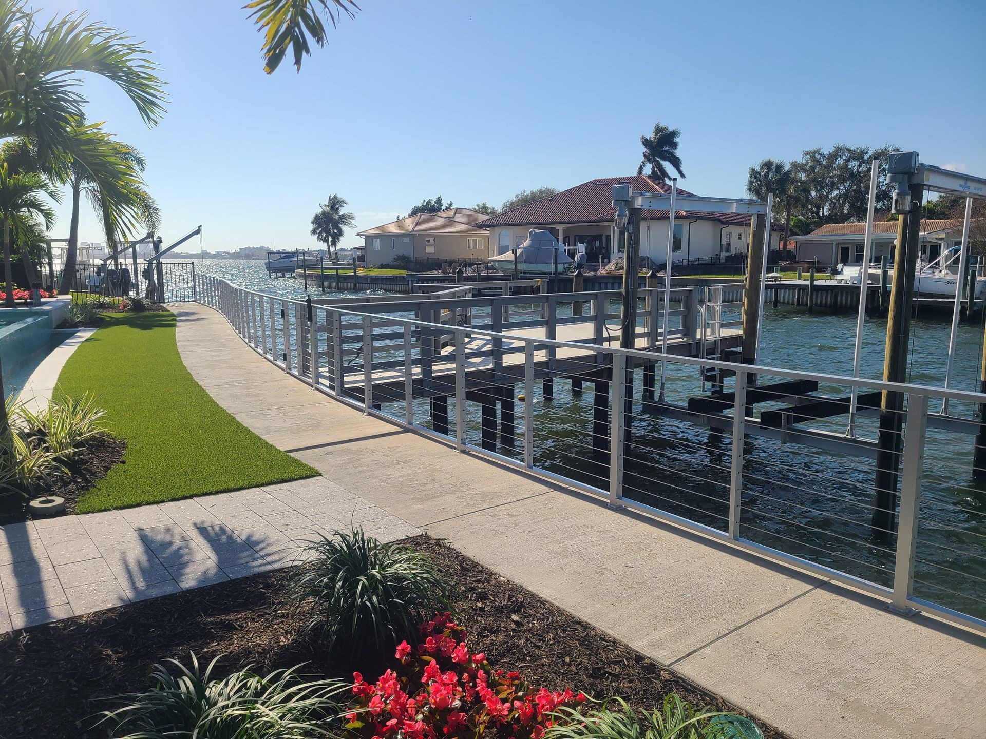 A walkway leading to a dock overlooking a body of water
