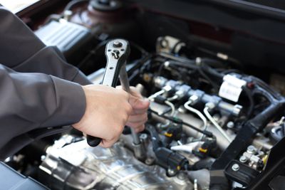 Car Repair — Mechanic Doing Auto Repair in Bexley, OH