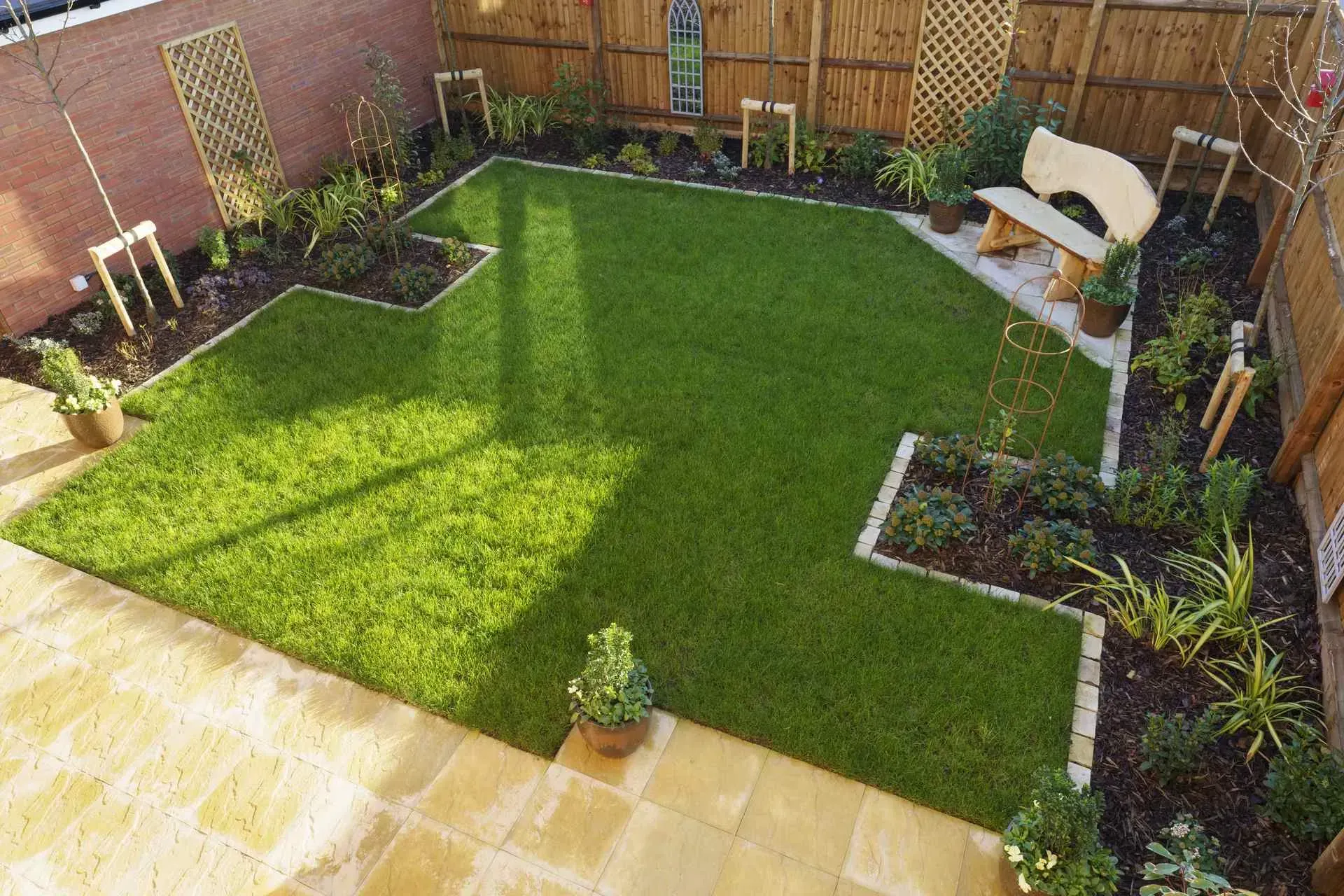 Finished new build garden design with lawn and planting in Cambridge