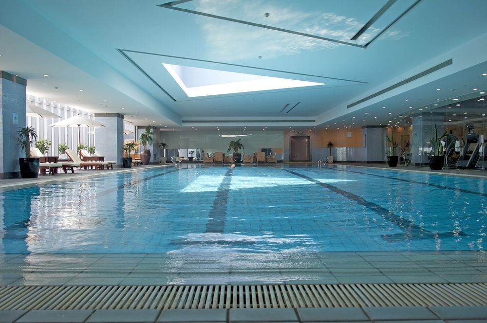 A Large Indoor Swimming Pool With A Skylight On The Ceiling — Pool Concepts in Howard Springs, NT