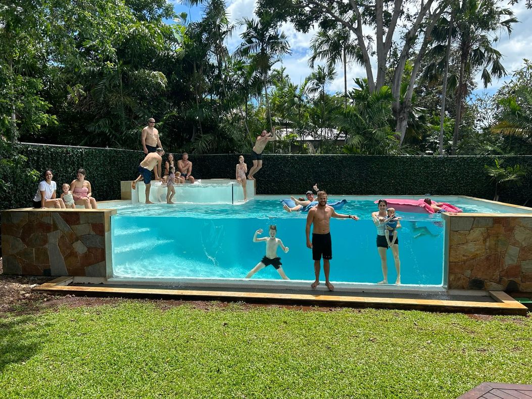 A Group Of People Are Playing In A Large Swimming Pool — Pool Concepts in Howard Springs, NT