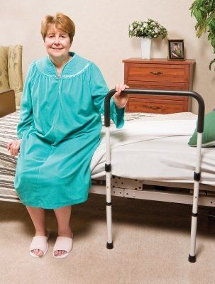 Provides patients with assistance getting into and out of the bed.