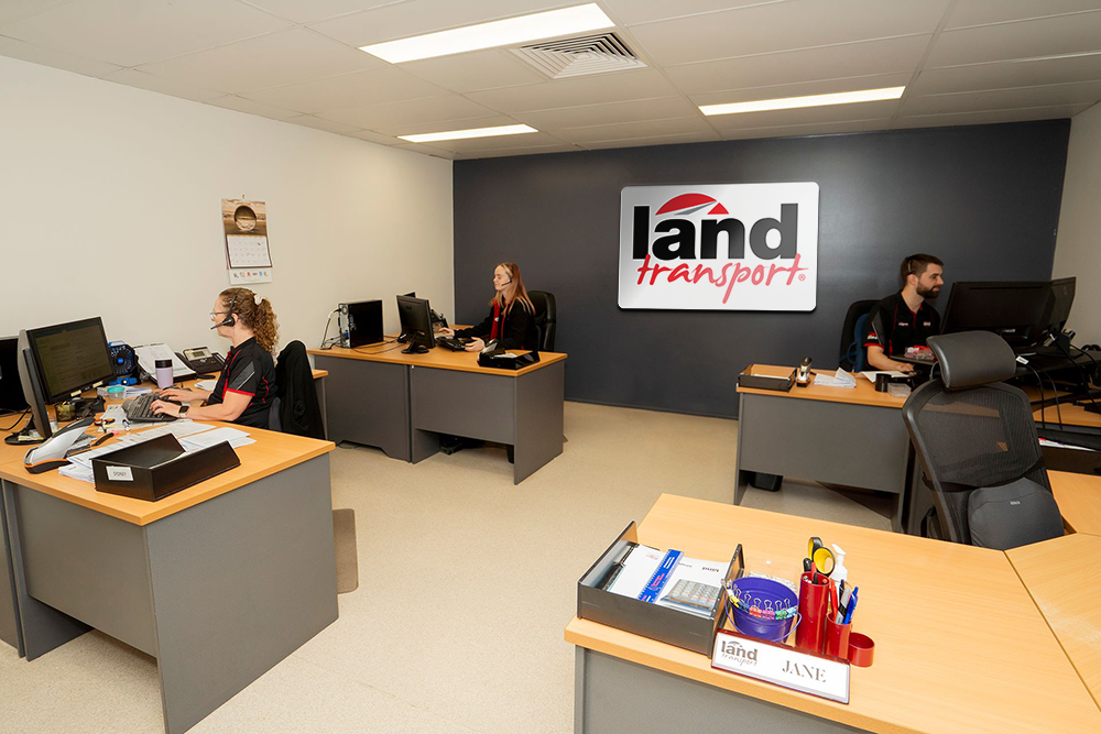 Land Transport team working in the office. Helping customers organise quotes and booking in deliveries.