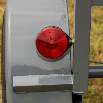 gray fender with red signal light