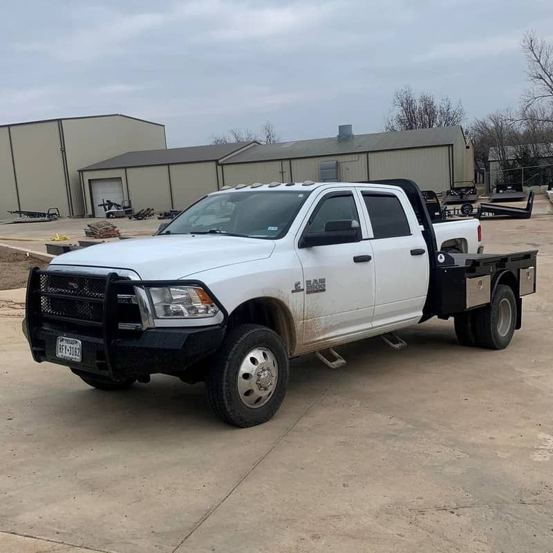 white dodge truck with black flatbed