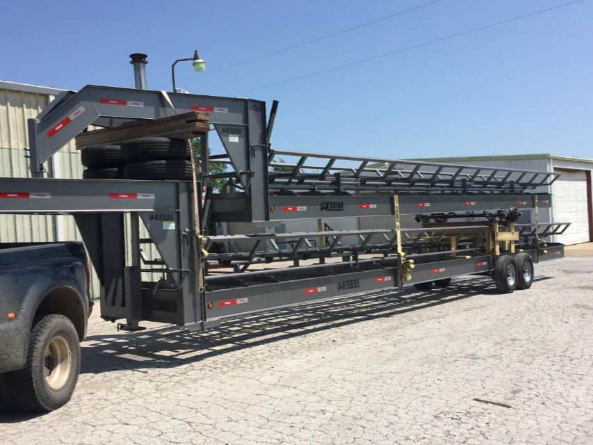 photo of red gooseneck livestock trailer
