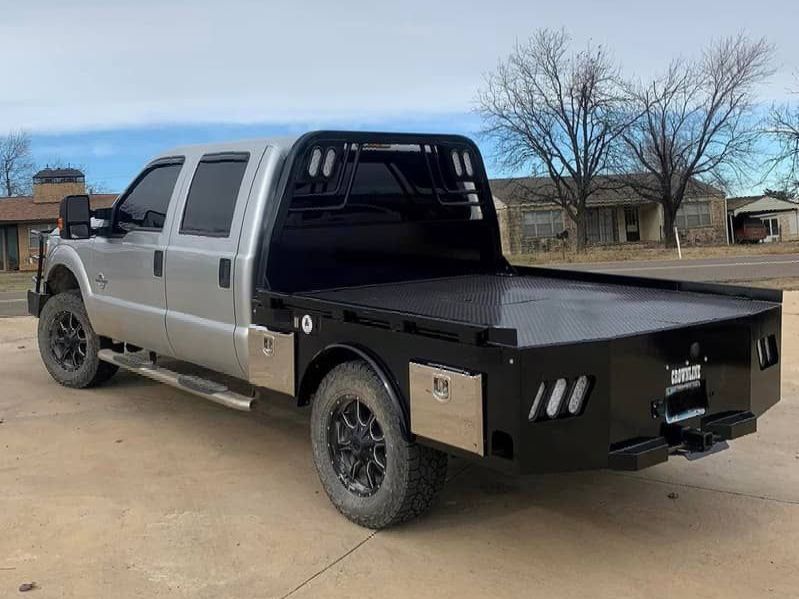 image white truck with black skirted bed