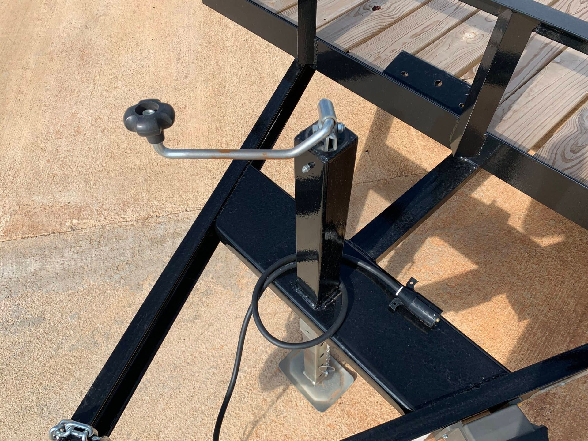trailer jack with silver handle and black knob