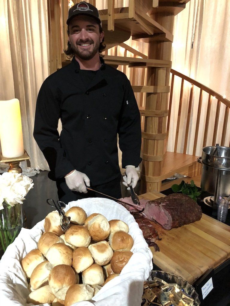 Man Slicing the Steak — Gainesville, FL — Hill’s Bar-b-que & Catering