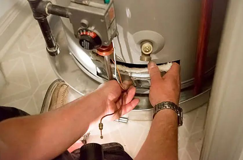 A wooden fence with a gate attached to it.