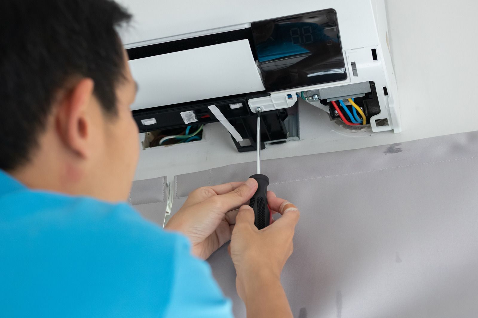 A wooden fence with a gate attached to it.