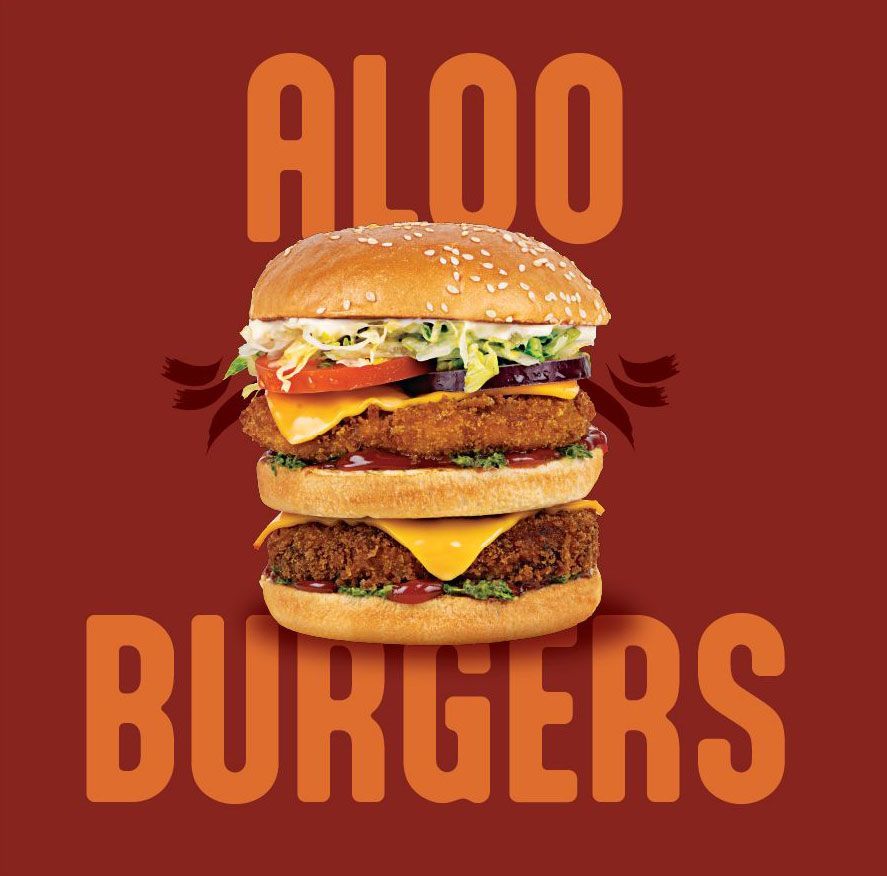 A pile of fried chicken strips on a red background.