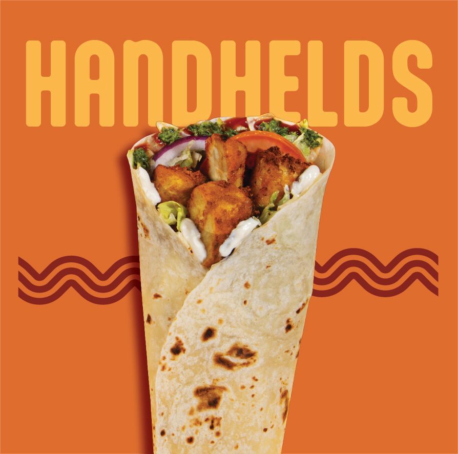 A plate of fried chicken and french fries with a dipping sauce.