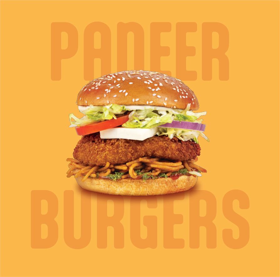 A plate of fried chicken and french fries with a dipping sauce.