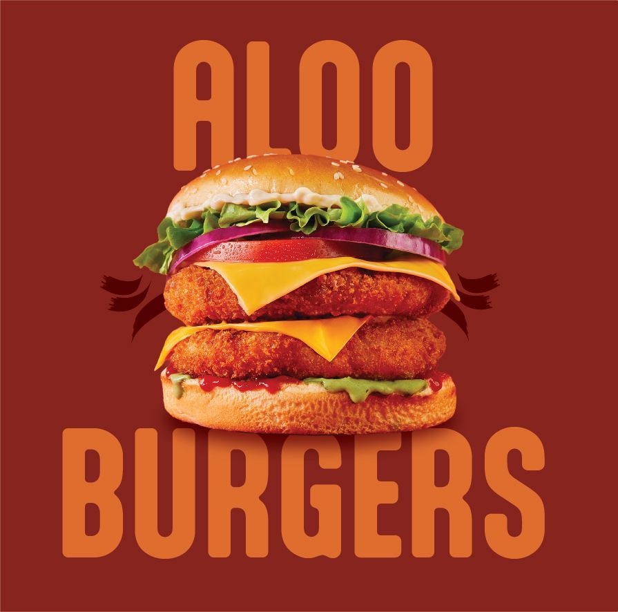 A pile of fried chicken strips on a red background.