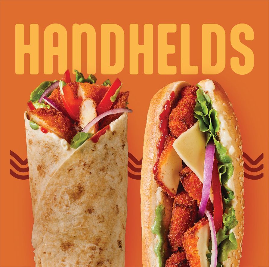 A plate of fried chicken and french fries with a dipping sauce.