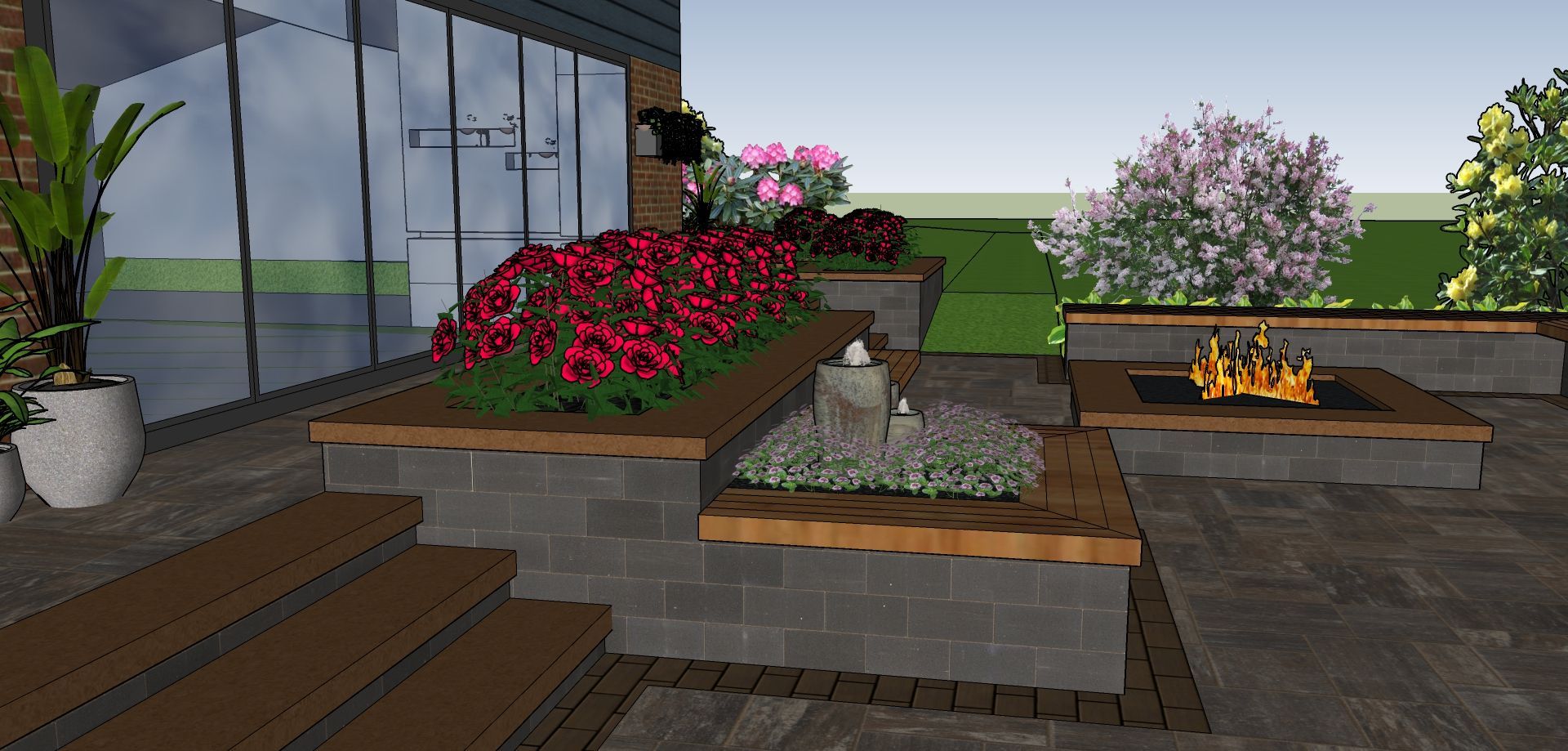 Outdoor patio with tiered planters, a fire pit, and greenery.