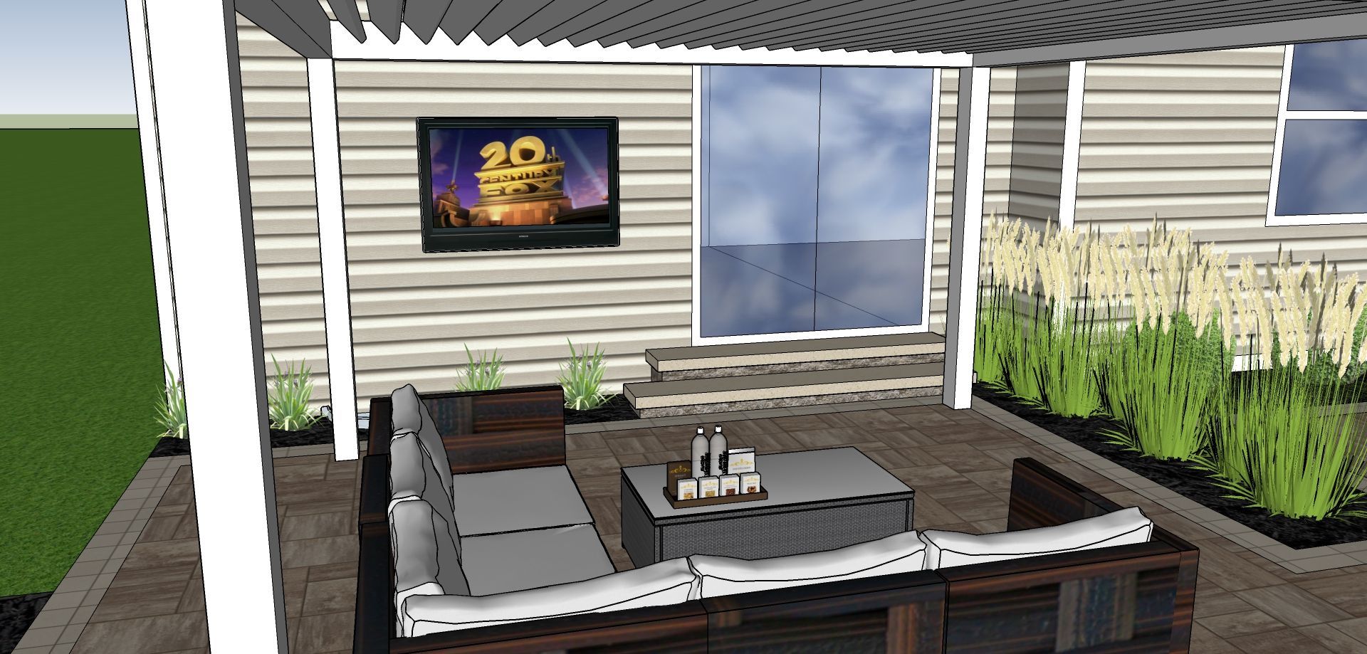 Outdoor patio with seating, TV, and plants.