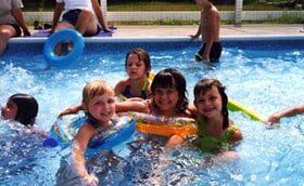 Kids playing on swimming pool — Child Care Services in Wappingers Falls, NY
