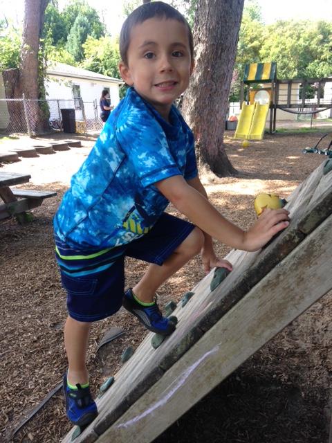 Little Boy Climbing — Child Care Services in Wappinger Falls, NY