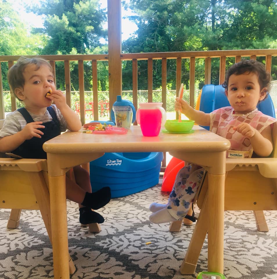 Two Toddlers Eating on the Table — Wappinger Falls, NY — Raising the Standard for Child Care Services
