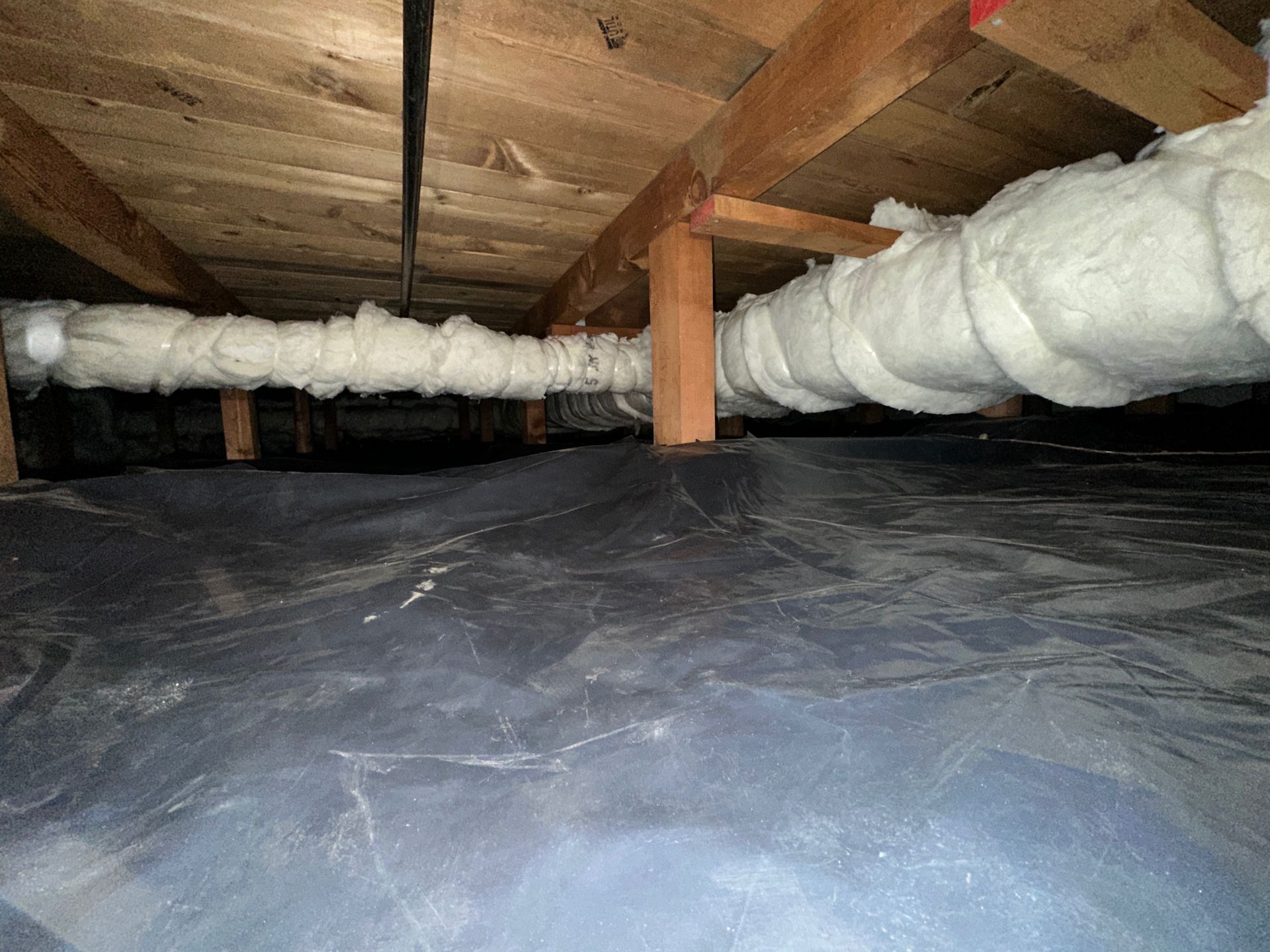 There is a pipe in the ceiling of a house.