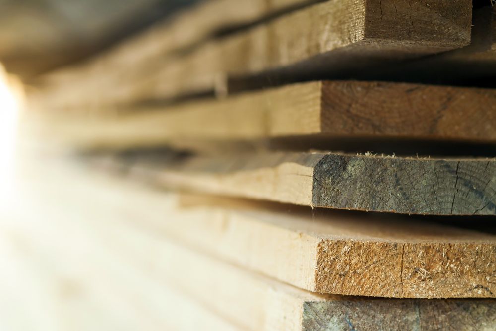 Orderly Arrangement of Wooden Blocks Stacked on One Another — Sly Bros in Maclean, NSW